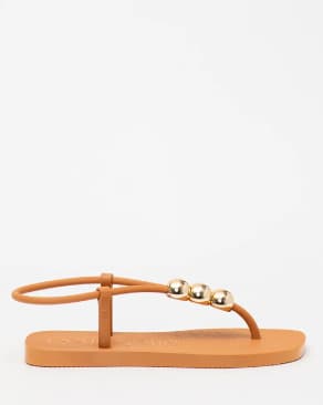 Sandália rasteira laranja da Petite Jolie.